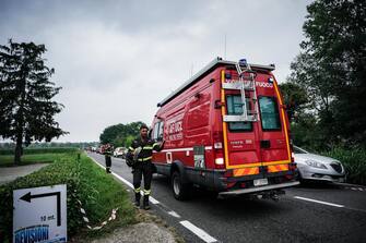 A plane of the acrobatic patrol of the Frecce Tricolori crashed near the airport of Caselle, Turin, Italy, 16 September 2023. The pilot escaped by parachuting while a five-year-old girl died in the crash. The aircraft crashed at the bottom of the track involving, according to the first news, a car.    ANSA / TINO ROMANO