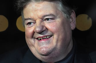 British actor Robbie Coltrane attends the premiere for the film 'Great Expectations' on the closing night of the 56th BFI London Film Festival in central London on October 21, 2012. AFP PHOTO / CARL COURT        (Photo credit should read CARL COURT/AFP via Getty Images)