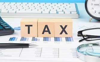 Concept of tax filing. Tax calculation, reports, and filing taxes.