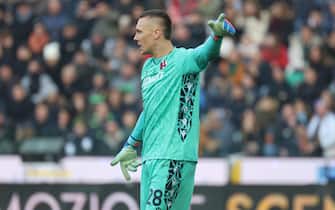 Bologna's Lukasz Skorupski in action during the italian soccer Serie A match between Udinese Calcio vs Bologna FC 1909 on december 30, 2023 at the Bluenergy stadium in Udine, Italy. ANSA/GIANNI STRIZZOLO