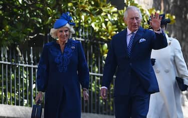 epa10565991 Britain's King Charles III (R) and Camilla, the  Queen Consort arrive for the Easter Sunday service at St Georges Chapel at Windsor Castle in Windsor, Britain, 09 April 2023.  EPA/NEIL HALL