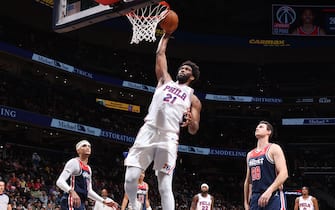 WASHINGTON, DC -  DECEMBER 6: Joel Embiid #21 of the Philadelphia 76ers drives to the basket during the game against the Washington Wizards on December 6, 2023 at Capital One Arena in Washington, DC. NOTE TO USER: User expressly acknowledges and agrees that, by downloading and or using this Photograph, user is consenting to the terms and conditions of the Getty Images License Agreement. Mandatory Copyright Notice: Copyright 2023 NBAE (Photo by Stephen Gosling/NBAE via Getty Images)