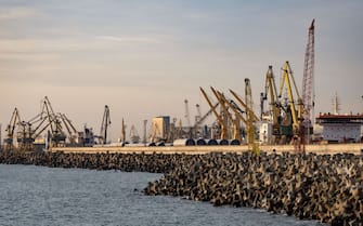 A picture taken on December 7 2022 shows cranes at Constanta's harbour. (Photo by Thomas SAMSON / AFP) (Photo by THOMAS SAMSON/AFP via Getty Images)