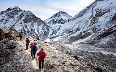 Hikers walk to Everest Base Camp during Everest Base Camp trekking in Nepal.