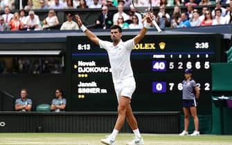 Serbia's Novak Djokovic celebrates victory against Italy's Jannik Sinner in the quarter finals match on day nine of the 2022 Wimbledon Championships at the All England Lawn Tennis and Croquet Club, Wimbledon. Picture date: Tuesday July 5, 2022. (Photo by Aaron Chown/PA Images via Getty Images)