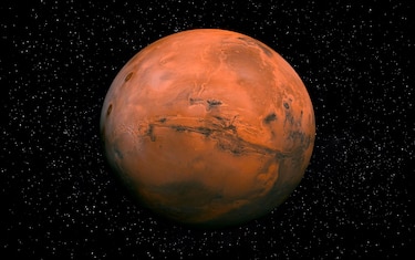 Red Planet Mars in Space surrounded by Stars. This image elements furnished by NASA.