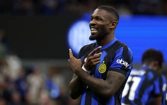 Inter Milan s Marcus Thuram jubilates after scoring goal of 1 to 0 during the Italian serie A soccer match between Fc Inter  and Cagliari  at  Giuseppe Meazza stadium in Milan, 14 April 2024.
ANSA / MATTEO BAZZI