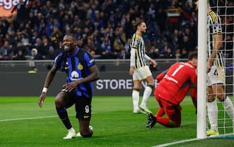 Inter’s Marcus Thuram jubilates after the own goal scored by Juventus’ Federico Gatti during the Italian serie A soccer match between Fc Inter  and Juventus at  Giuseppe Meazza stadium in Milan, 4 February 2024.ANSA / MATTEO BAZZI