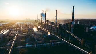 industrial landscape with heavy pollution produced by a large factory