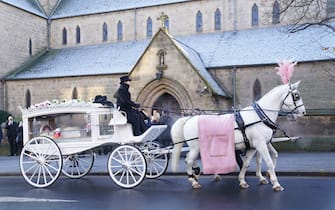 The horse drawn hearse carrying the casket of baby Indi Gregory, arrives at St Barnabus Cathedral, Nottingham, for her funeral service. The baby girl died shortly after her life-support treatment was withdrawn after her parents, Dean Gregory and Claire Staniforth who are both in their 30s and from Ilkeston, Derbyshire, lost legal bids in the High Court and Court of Appeal in London for specialists to keep treating her. Picture date: Friday December 1, 2023.