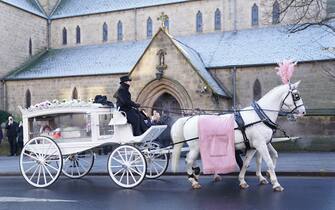 The horse drawn hearse carrying the casket of baby Indi Gregory, arrives at St Barnabus Cathedral, Nottingham, for her funeral service. The baby girl died shortly after her life-support treatment was withdrawn after her parents, Dean Gregory and Claire Staniforth who are both in their 30s and from Ilkeston, Derbyshire, lost legal bids in the High Court and Court of Appeal in London for specialists to keep treating her. Picture date: Friday December 1, 2023.