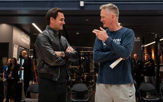 SAN FRANCISCO, CALIFORNIA - MARCH 9: Roger Federer speaks with Golden State Warriors head coach Steve Kerr before a game while promoting the Laver Cup San Francisco Launch for 2025 at Chase Center on March 9, 2024 in San Francisco, California. (Photo by Loren Elliott/Getty Images for Laver Cup)