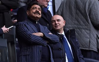 Tottenham Hotspur's English chairman Daniel Levy (R) speaks with Fulham owner Shahid Khan (L) ahead of kick-off in the English Premier League football match between Tottenham Hotspur and Nottingham Forest at Tottenham Hotspur Stadium in London, on March 11, 2023. (Photo by JUSTIN TALLIS / AFP) / RESTRICTED TO EDITORIAL USE. No use with unauthorized audio, video, data, fixture lists, club/league logos or 'live' services. Online in-match use limited to 120 images. An additional 40 images may be used in extra time. No video emulation. Social media in-match use limited to 120 images. An additional 40 images may be used in extra time. No use in betting publications, games or single club/league/player publications. /  (Photo by JUSTIN TALLIS/AFP via Getty Images)