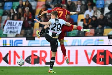 UDINE, ITALY - APRIL 25: Jaka Bijolof Udinese Calcio  competes for the ball with Sardar Azmoun of AS Roma during the Serie A TIM match between Udinese Calcio and AS Roma at Dacia Arena on April 25, 2024 in Udine, Italy. (Photo by Alessandro Sabattini/Getty Images) (Photo by Alessandro Sabattini/Getty Images)