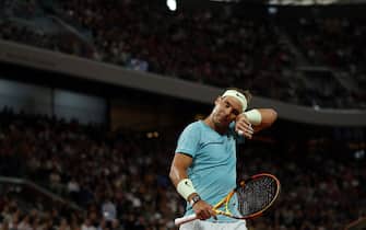 epa11373527 Rafael Nadal of Spain reacts during his Men's Singles 1st round match against Alexander Zverev of Germany during the French Open Grand Slam tennis tournament at Roland Garros in Paris, France, 27 May 2024.  EPA/YOAN VALAT