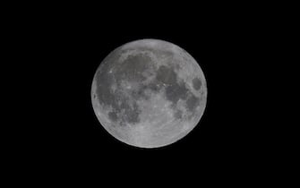 The 'super blue moon' lights up the skies at Iklin, Malta on 31 August, 2023
A super moon is called so because the moon appears significantly large in the sky since it is the closest to Earth at a time when it is full. Today, the moon will be 357,244 km from the Earth. It is also to be noted that this particular full moon will be the second to occur in the month of August, after the first one on August 1. As a result, it is called a blue moon. (Photo by Domenic Aquilina/NurPhoto via Getty Images)