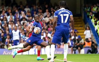 Chelsea's Axel Disasi (left) scores their side's first goal of the game during the Premier League match at Stamford Bridge, London. Picture date: Sunday August 13, 2023.