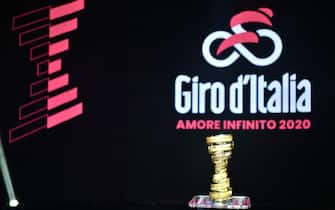 The winner's "Never ending trophy" (Trofeo Senza Fine) and the race logo are pictured during the presentation of the Giro d'Italia 2020cycling race on October 24, 2019 in Milan. (Photo by Marco BERTORELLO / AFP) (Photo by MARCO BERTORELLO/AFP via Getty Images)