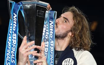 LONDON, ENGLAND - NOVEMBER 17:  Stefanos Tsitsipas of Greece celebrates with the trophy after his singles final match victory against Dominic Thiem of Austria during Day Eight of the Nitto ATP World Tour Finals at The O2 Arena on November 17, 2019 in London, England. (Photo by Julian Finney/Getty Images)