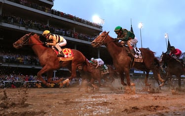 LOUISVILLE, KENTUCKY - MAY 04: Country House #20, ridden by jockey Flavien Prat, crosses the finish line to win the 145th running of the Kentucky Derby at Churchill Downs on May 04, 2019 in Louisville, Kentucky. Country House #20 was declared the winner after a stewards review disqualified Maximum Security #7. (Photo by Rob Carr/Getty Images)