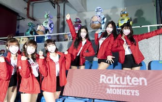 1218163799 TAOYUAN, TAIWAN - APRIL 11: Rakunten girls and the robot cheerleading team poses prior to the CPBL season opening game between Rakuten Monkeys and CTBC Brothers at Taoyuan International Baseball Stadium on April 11, 2020 in Taoyuan, Taiwan. (Photo by Gene Wang/Getty Images)