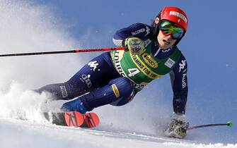 epa08883299 Federica Brignone of Italy in action during the Women's Giant Slalom race at the FIS Alpine Skiing World Cup in Courchevel, France, 14 December 2020.  EPA/SEBASTIEN NOGIER