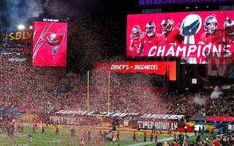 epa08995303 Tampa Bay Buccaneers on the big screen after the Tampa Bay Buccaneers defeating the Kansas City Chiefs in the National Football League Super Bowl LV at Raymond James Stadium in Tampa, Florida, USA, 07 February 2021.  EPA/GARY BOGDON