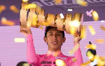 Colombian rider Egan Bernal of the Ineos Grenadiers team poses with the trophy after winning the overall classification of the 2021 Giro d'Italia cycling race following the 21st stage, an individual time trial over 30.3km from Senago to Milan, Italy, 30 May 2021. ANSA/LUCA ZENNARO