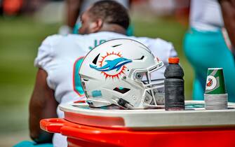 CHICAGO, IL - AUGUST 14: A detail view of a Miami Dolphins helmet is seen resting on a Gatorade cooler during a preseason game between the Chicago Bears and the Miami Dolphins on August 14, 2021 at Soldier Field in Chicago, IL. (Photo by Robin Alam/Icon Sportswire via Getty Images)