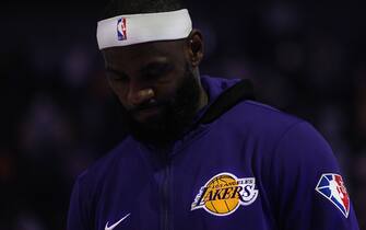 SAN FRANCISCO, CALIFORNIA - OCTOBER 08: A detailed view of the logos on the warm ups worn by LeBron James #6 of the Los Angeles Lakers while he stands during the singing of the National Anthem prior to playing the Golden State Warriors at Chase Center on October 08, 2021 in San Francisco, California. NOTE TO USER: User expressly acknowledges and agrees that, by downloading and/or using this photograph, User is consenting to the terms and conditions of the Getty Images License Agreement. (Photo by Thearon W. Henderson/Getty Images)