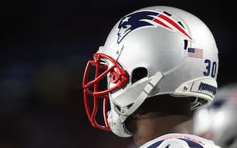 BUFFALO, NY - OCTOBER 29: A view of the grill and logo on the helmet of Jason McCourty #30 of the New England Patriots as he looks on from the sideline during NFL game action against the Buffalo Bills at New Era Field on October 29, 2018 in Buffalo, New York. (Photo by Tom Szczerbowski/Getty Images)