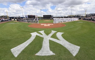 TAMPA, FL - FEBRUARY 23:  A general view of George M. Steinbrenner Field as players and coaches from the Detroit Tigers and the New York Yankees line-up during the National Anthem prior to the Spring Training game at George M. Steinbrenner Field on February 23, 2018 in Tampa, Florida. The Yankees defeated the Tigers 3-1.  (Photo by Mark Cunningham/MLB Photos via Getty Images)
