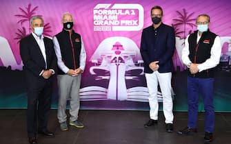 IMOLA, ITALY - APRIL 18: (L-R) Chase Carey, Greg Maffei, President & Chief Executive Officer of Liberty Media Corporation, Tom Garfinkel, CEO of the Miami Dolphins and Stefano Domenicali, CEO of the Formula One Group, pose for a photo following a press conference to announce the 2022 F1 Miami Grand Prix ahead of  the F1 Grand Prix of Emilia Romagna at Autodromo Enzo e Dino Ferrari on April 18, 2021 in Imola, Italy. (Photo by Dan Istitene - Formula 1/Formula 1 via Getty Images)