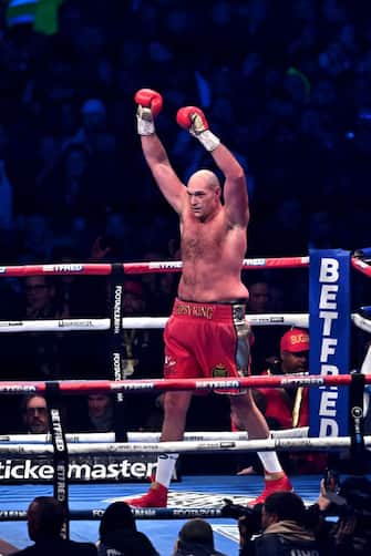 Britain's Tyson Fury reacts after the referee stops the fight against Britain's Derek Chisora during their WBC heavyweight title boxing match, at the Tottenham Hotspur stadium in east London, on December 3, 2022. (Photo by Ben Stansall / AFP) (Photo by BEN STANSALL/AFP via Getty Images)