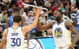 Orlando, Florida, USA, November 3, 2022, Golden State Warriors players Stephen Curry and Draymond Green gives a high five during the game at the Amway Center.  (Photo by Marty Jean-Louis/Sipa USA)