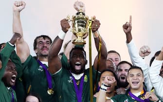 South Africa's Siya Kolisi lifts the Webb Ellis cup after South After win the 2019 Rugby World Cup final match at Yokohama Stadium.