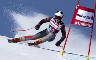 epa10371650 Lara Colturi of Albania in action during the women's Super G race at the FIS Alpine Skiing World Cup in St. Moritz, Switzerland, 18 December 2022.  EPA/JEAN-CHRISTOPHE BOTT