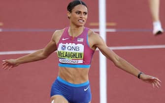 EUGENE, OREGON - JULY 22: Sydney McLaughlin of Team United States crosses the finish line to win gold and set a new world record in the Women's 400m Hurdles Final on day eight of the World Athletics Championships Oregon22 at Hayward Field on July 22, 2022 in Eugene, Oregon. (Photo by Patrick Smith/Getty Images)
