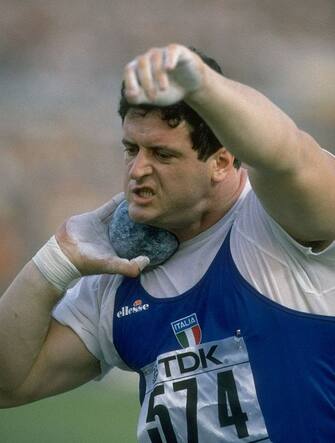 29 Aug 1987:  Alessandro Andrei of Italy prepares to throw during the Shot Putt event at the 1987 World Championships in Rome, Italy. Andrei won the silver medal with a throw of 21.88 metres. \ Mandatory Credit: Tony  Duffy/Allsport