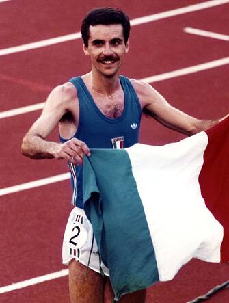 HELSINKI - AUGUST 9:  Alberto Cova of Italy celebrates after winning the men's 10,000m final at the 1983 World Athletics Championships held at the Olympic Stadium on August 9, 1983 in Helsinki, Finland.  (Photo by Robert Riger/Getty Images) 