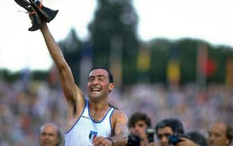 1987:  Maurizio Damilano of Italy celebrates after his victory in the 20 kilometres Walk during the World Championships at the Olympic Stadium in Rome. Damilano won the gold medal with a time of 1:20.45 hours. \ Mandatory Credit: Bob  Martin/Allsport