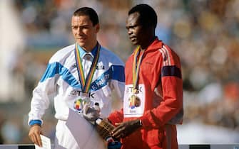 Gold medallist Paul Kipkoech of Kenya (r) and silver medallist Francesco Panetta of Italy (l) stand atop the dais after receiving their medals  (Photo by S&G/PA Images via Getty Images)