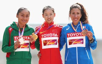 LONDON, ENGLAND - AUGUST 13:  Maria Guadalupe Gonzalez, silver, Jiayu Yang of China, gold, and Antonella Palmisano of Italy, bronze, pose with their medals after the Women's 20 Kilometres Race Walk final during day ten of the 16th IAAF World Athletics Championships London 2017 at The Mall on August 13, 2017 in London, United Kingdom.  (Photo by Michael Steele/Getty Images)