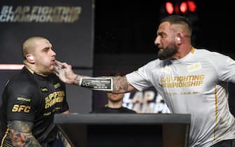 COLUMBUS, OHIO - MARCH 05:  Maksymilian â€œMad Maxâ€  LeÅ›niak slaps Nikolas â€œPredatorâ€  Toth during the Slap Fighting Championships at the Arnold Sports Festival in Columbus Convention Center on March 05, 2022 in Columbus, Ohio. (Photo by Gaelen Morse/Getty Images)
