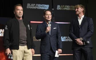 COLUMBUS, OHIO - MARCH 05:  Logan Paul and Arnold Schwarzenegger speak before the Slap Fighting Championships at the Arnold Sports Festival in Columbus Convention Center on March 05, 2022 in Columbus, Ohio. (Photo by Gaelen Morse/Getty Images)