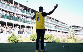 SCOTTSDALE, ARIZONA - JANUARY 30:  Tony Finau reacts to the crowd on the 16th hole while wearing a jersey of former NBA player Kobe Bryant during the first round of the Waste Management Phoenix Open at TPC Scottsdale on January 30, 2020 in Scottsdale, Arizona. Bryant and his 13-year old daughter were among nine passengers killed in a helicopter crash on January 26, 2020. (Photo by Christian Petersen/Getty Images)