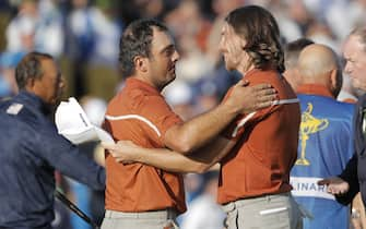 Francesco Molinari and Tommy Fleetwood of Europe celebrate victory on the 15th green in their afternoon foursomes match versus Tiger Woods and Bryson DeChambeau of USA during day two of the 2018 Ryder Cup at Le Golf National near Versailles on September 29th 2018 in France (Photo by Tom Jenkins)