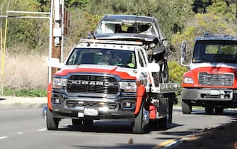 Palos Verdes, CA  - Tiger Woods' Genesis GV80 is removed from the crash scene following a horrific early morning accident. The Golf great was hospitalized following a serious single-car accident in L.A. County this morning. According to a statement from the LA Sheriff's Dept., Tiger was extricated from the wreck with the jaws of life. The single-vehicle roll-over traffic collision occurred on the border of Rolling Hills Estates and Rancho Palos Verdes," officials say.

Pictured: Tiger Woods

BACKGRID USA 23 FEBRUARY 2021 

USA: +1 310 798 9111 / usasales@backgrid.com

UK: +44 208 344 2007 / uksales@backgrid.com

*UK Clients - Pictures Containing Children
Please Pixelate Face Prior To Publication*