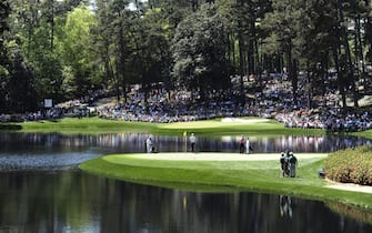 epa03657107 General view of Ike's Pond and the eighth (front) and ninth (back) greens during the Par 3 Contest after the final practice round of the 2013 Masters Tournament at the Augusta National Golf Club in Augusta, Georgia, USA, 10 April 2013.  The Masters tournament will be held 11 April through 14 April 2013.  EPA/TANNEN MAURY