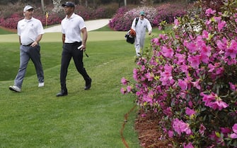 Five-time Masters champion Tiger Woods and 1992 Masters champion Fred Couples walk off the 13th green par-5 azalea hole on Amen Corner, during their practice round for the Masters at Augusta National Golf Club on Wednesday, April 6, 2022, in Augusta, GA, USA. Photo by Curtis Compton/The Atlanta Journal-Constitution/TNS/ABACAPRESS.COM